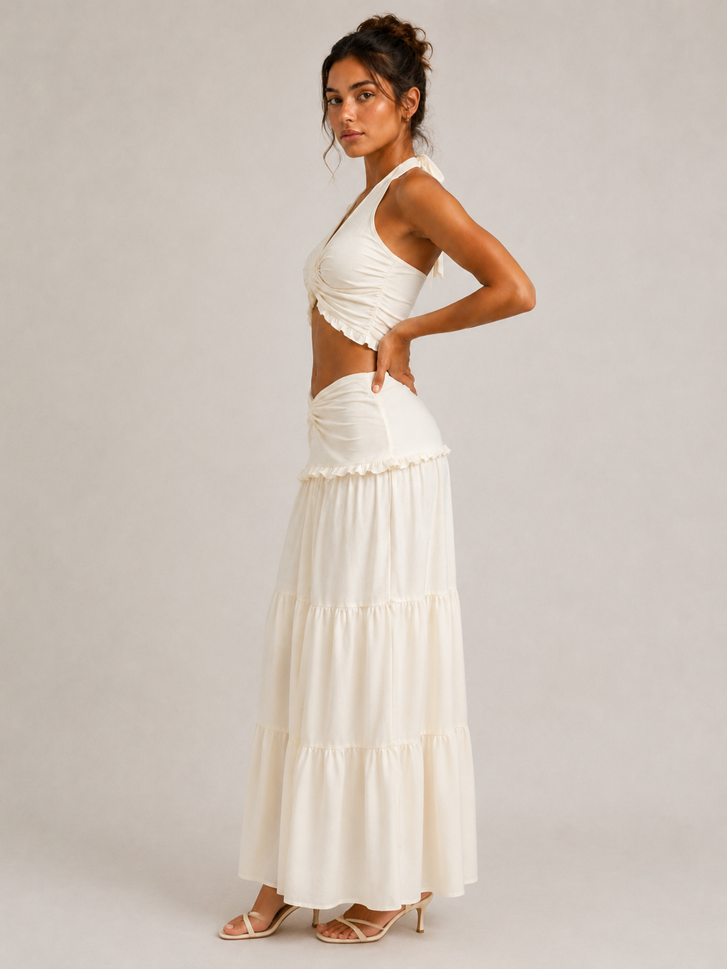 Elévaison Elara ivory twisted halter crop top and tiered maxi skirt set