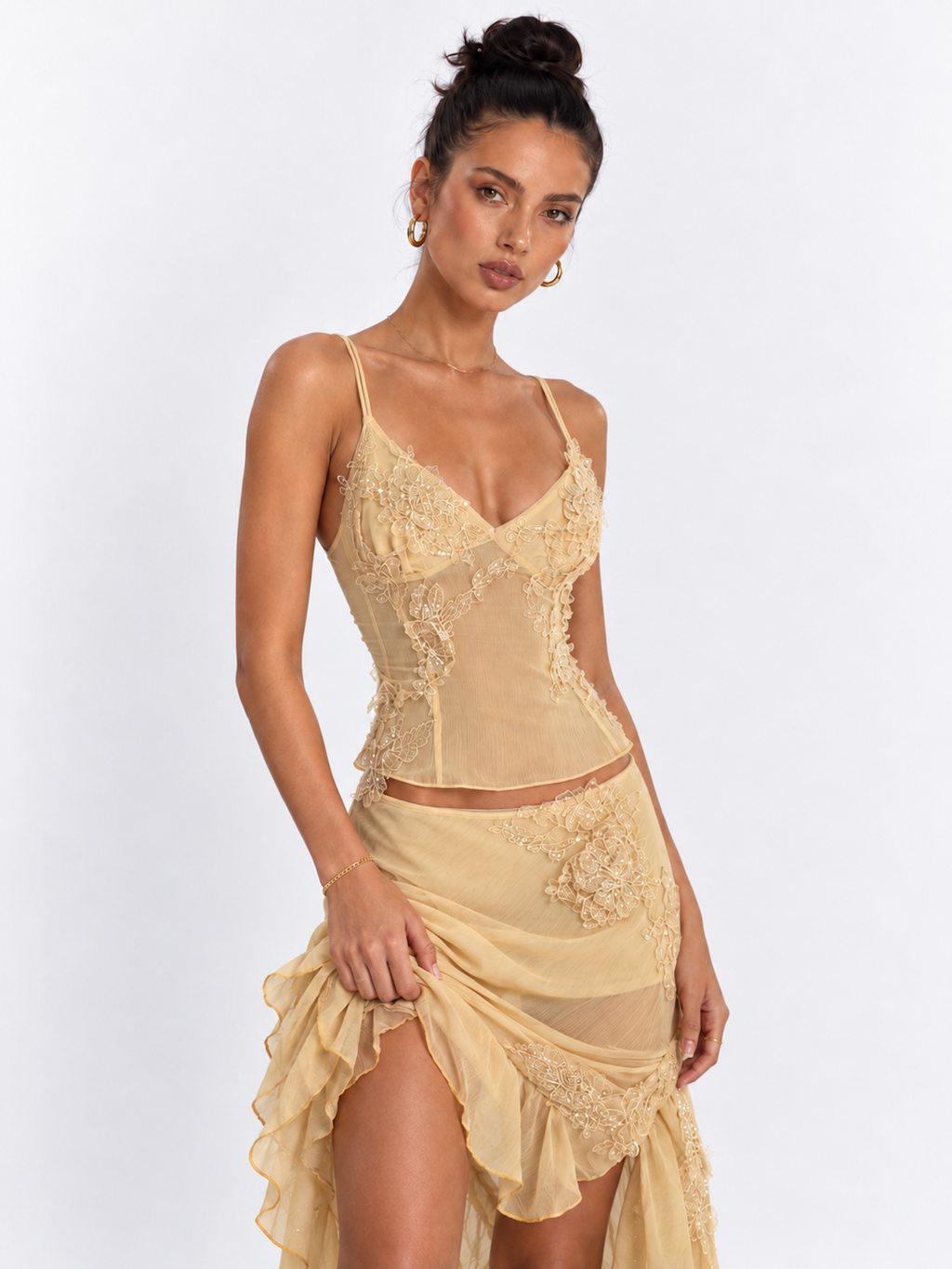 Close view of the Yellow Elévaison Valentina Two Piece, highlighting the camisole's lace and sequin embellishment.