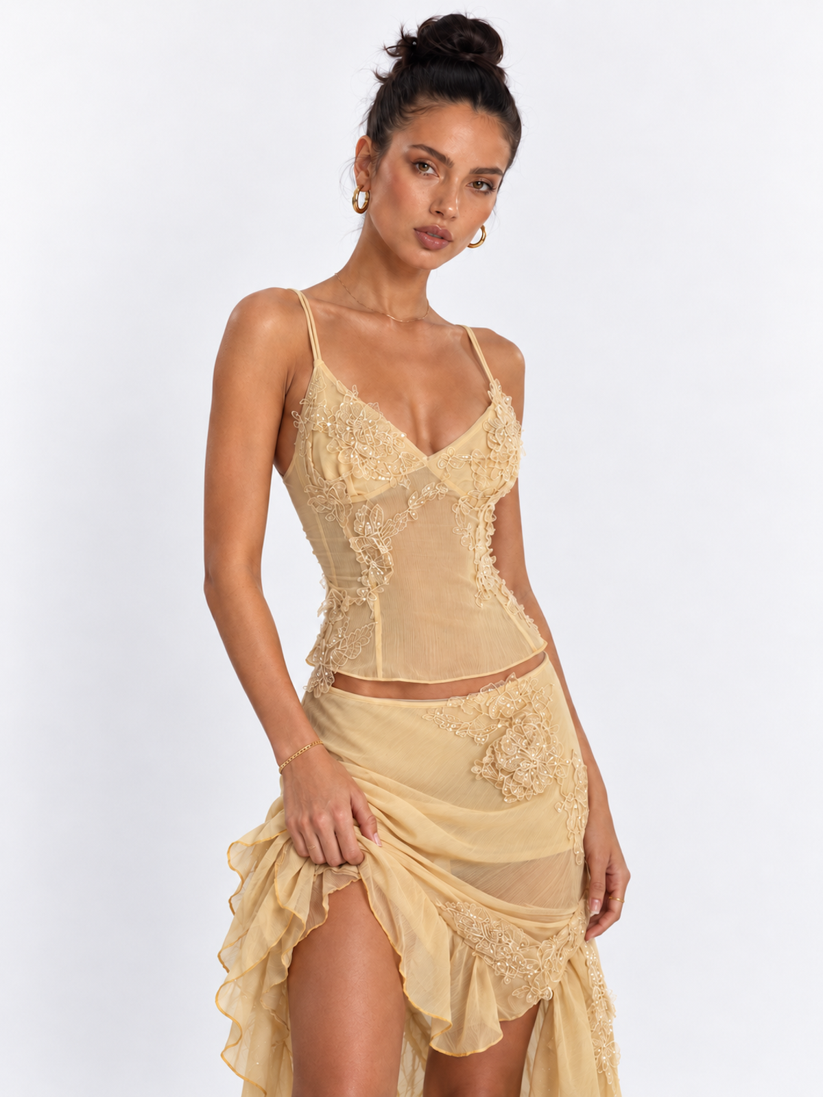 Close view of the Yellow Elévaison Valentina Two Piece, highlighting the camisole's lace and sequin embellishment.