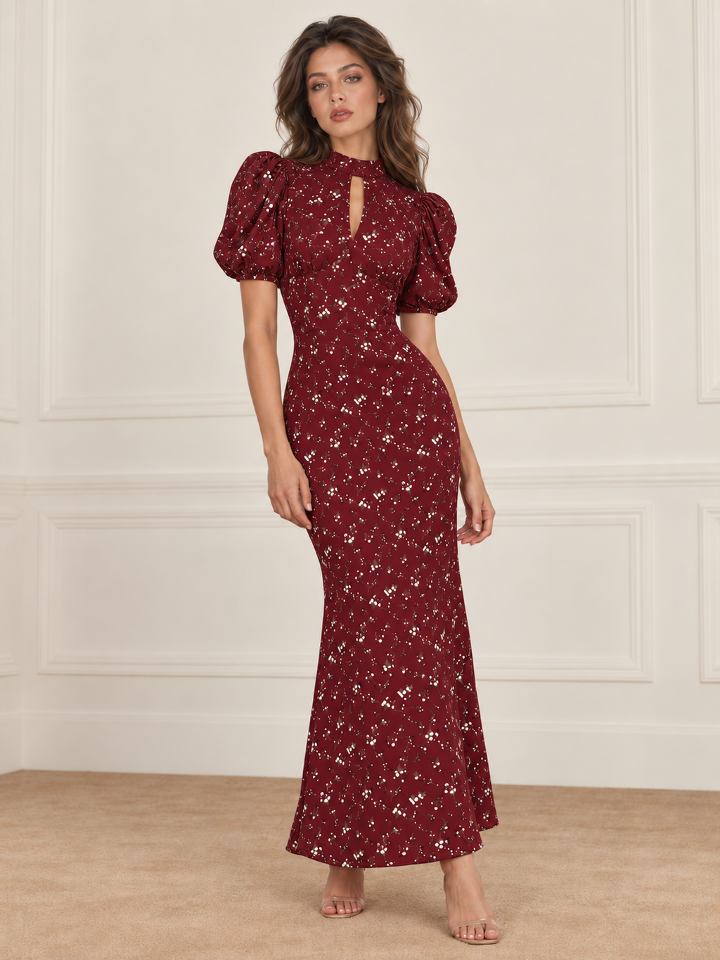 Elévaison Annelise Dress in Garnet Garden, full-length front view showing a fitted silhouette, puff sleeves and a floral print against a warm cream paneled studio background.